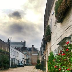 View of buildings in city against sky