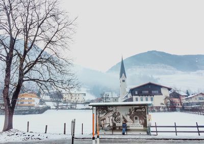 View of town against clear sky during winter