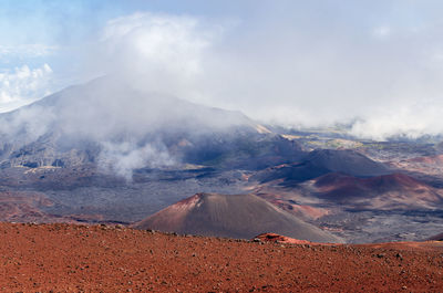 Scenic view of volcanic landscape against sky