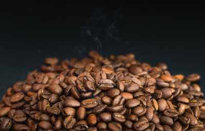 Close-up of coffee beans on black 