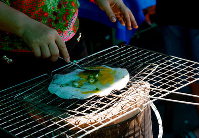 Midsection of chef preparing food