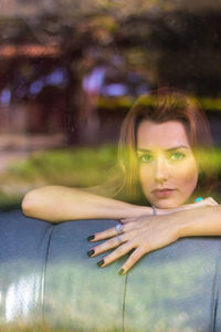 Portrait of young woman looking away