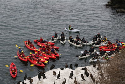 High angle view of people on boats on river