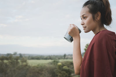 Series photo of young woman hand holding ceramic mug, positive emotion, chill and joyful