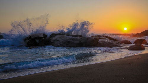 Scenic view of sea against sky during sunset
