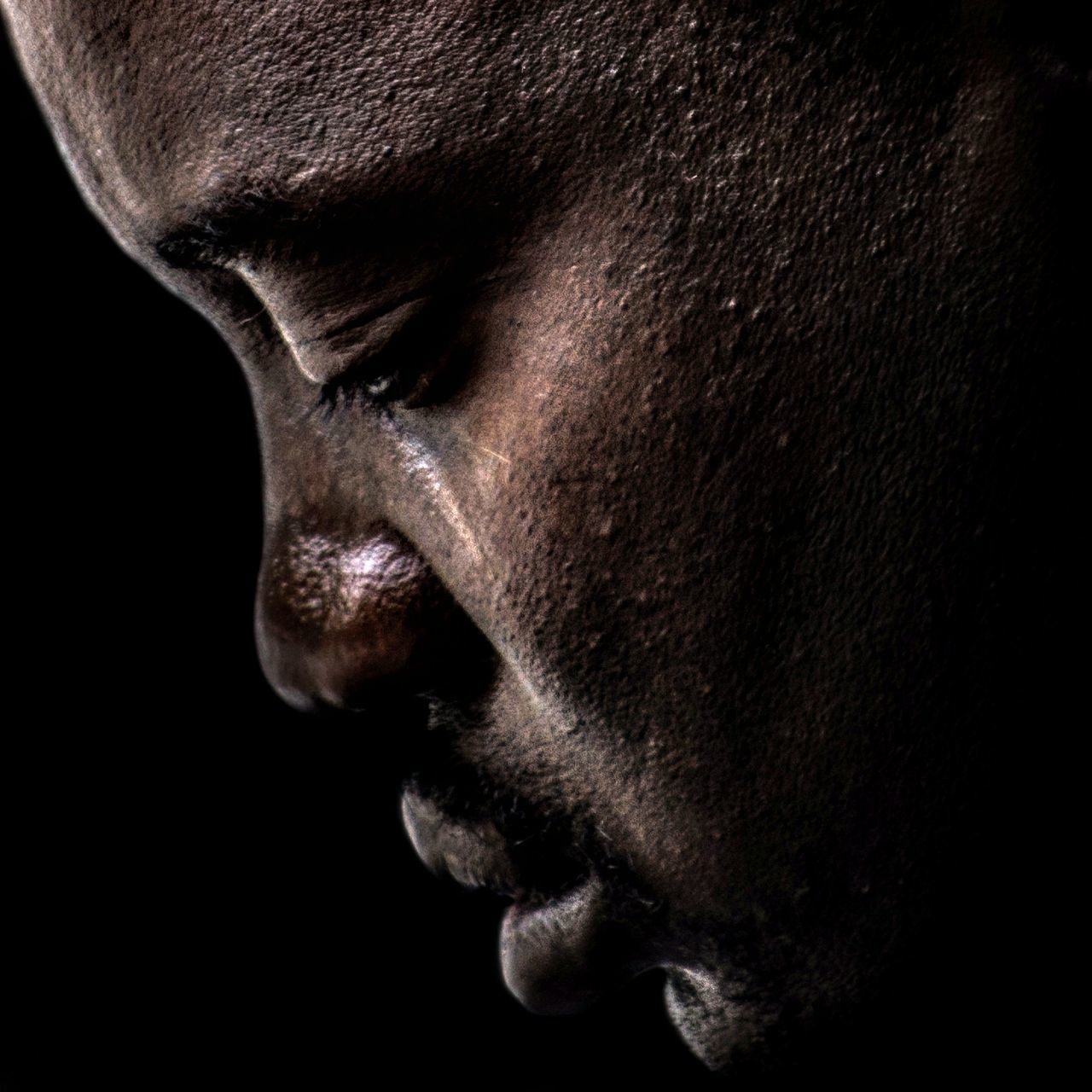 studio shot, black background, close-up, human face, young adult, one man only, human body part, only men, one person, adults only, adult, people