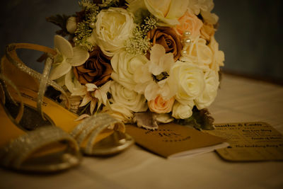 Close-up of wedding rings on table