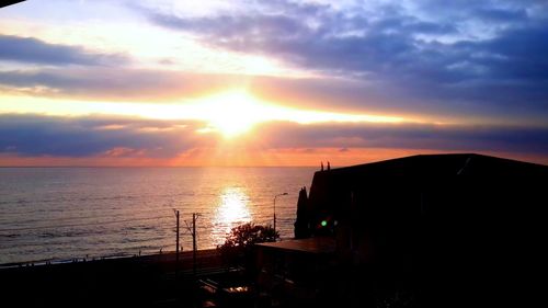 Scenic view of sunset over river