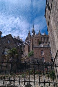 Low angle view of historic building against sky