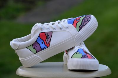 Close-up of white toy shoes