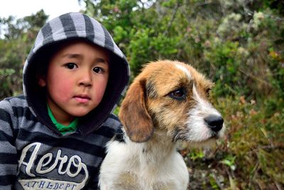 Portrait of boy with dog