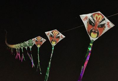 Close-up of multi colored pencils against black background