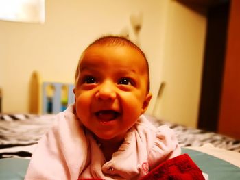 Portrait of cute baby at home