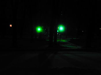 Man on road at night