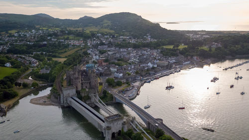 High angle view of river amidst buildings in city