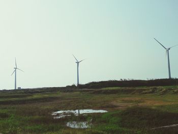 Wind turbines on field