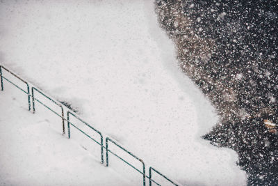 High angle view of steps on snow