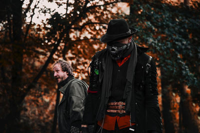 People standing in forest