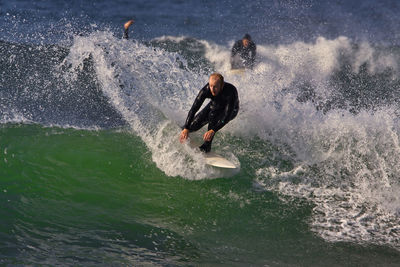 Man surfing in sea