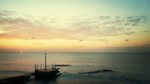 Scenic view of sea at sunset