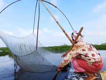 Fisherwoman in loktak 