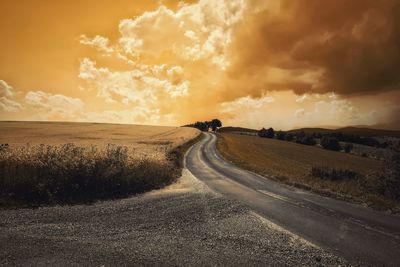 Road against sky during sunset