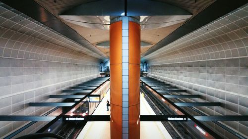 Low angle view of illuminated escalator