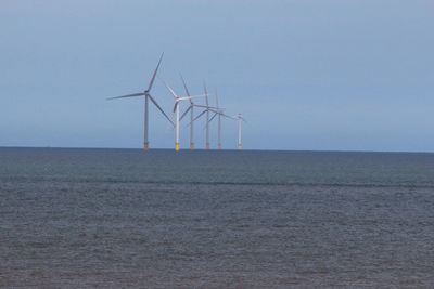 Windmills on landscape