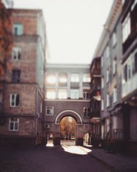 Street amidst buildings against sky