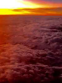 Scenic view of dramatic sky during sunset