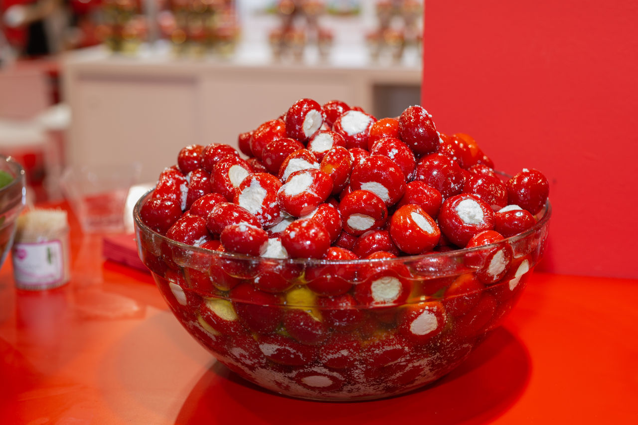 red, food and drink, food, fruit, produce, plant, indoors, healthy eating, container, no people, table, freshness, wellbeing, bowl, sweet food, berry, sweetness