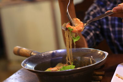 Close-up of hand holding food