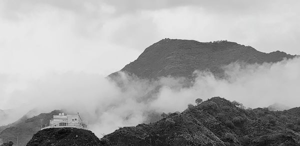 Panoramic view of mountain range against sky