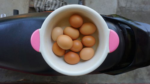 High angle view of eggs in bowl on table