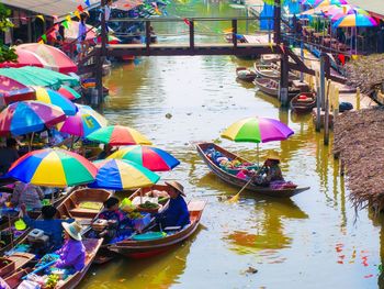 High angle view of boats in canal during rainy season