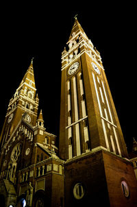 Low angle view of building against sky at night