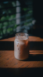 Close-up of drink in jar on table