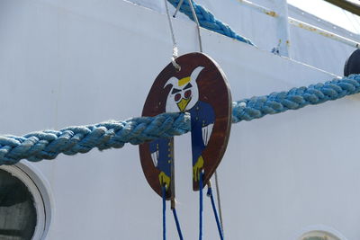 Close-up of rope and wood by boat