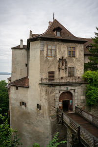 Castle against cloudy sky