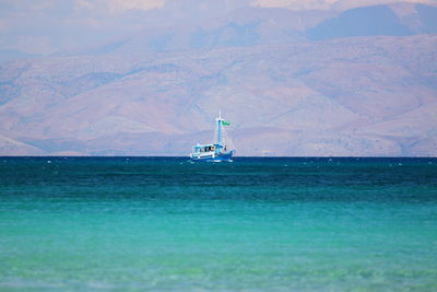 Sailboat sailing in sea