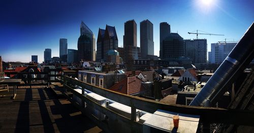 City skyline against blue sky