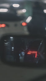 Close-up of car on road at night