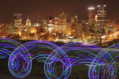 Illuminated cityscape at night