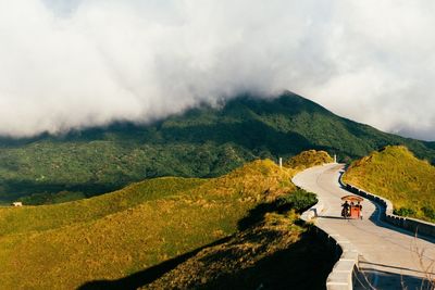 High angle view of road amidst landscape against sky