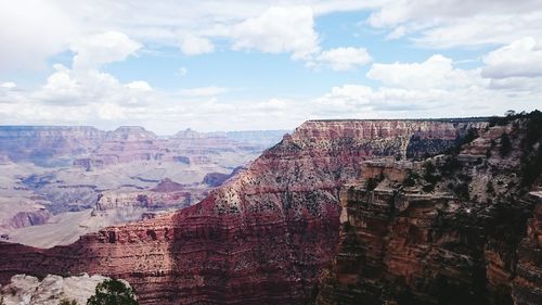 Scenic view of cliff against sky