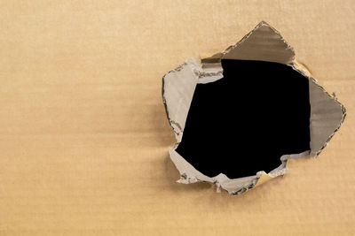 Close-up of hole on paper