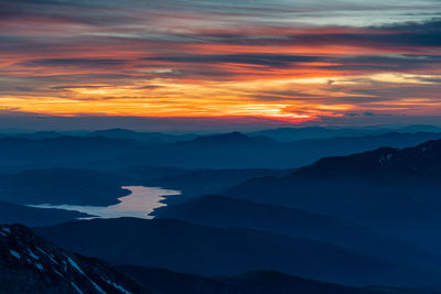 Scenic view of mountains against sky during sunset