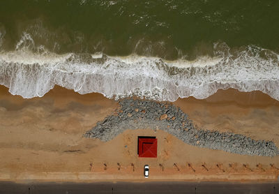 Scenic view of sea waves splashing on beach