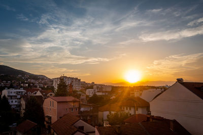 High angle view of townscape against sky at sunset