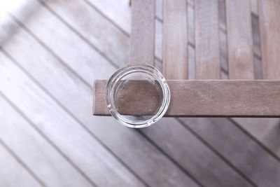 High angle view of ashtray on chair